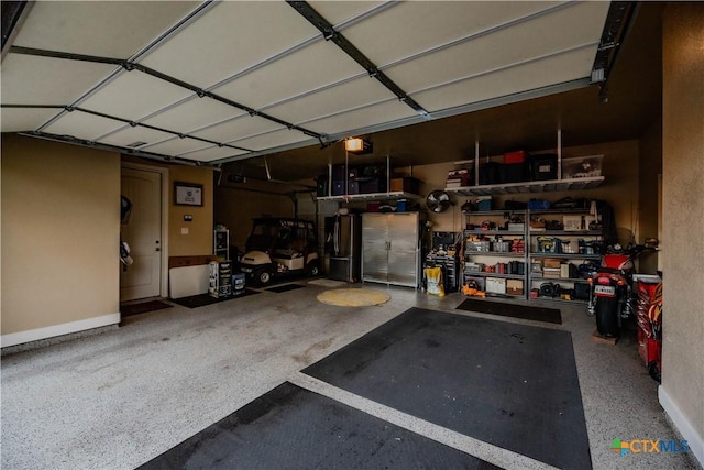 garage featuring a garage door opener