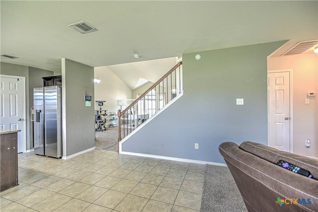 9505 Shimla Dr, Killeen, TX 76542 - living room with baseboards, light tile patterned floors, and stairway