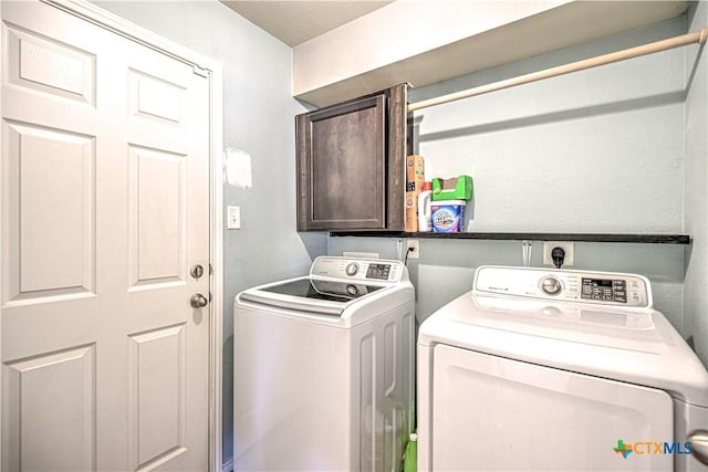 9505 Shimla Dr, Killeen, TX 76542 - laundry area featuring cabinet space and washing machine and dryer