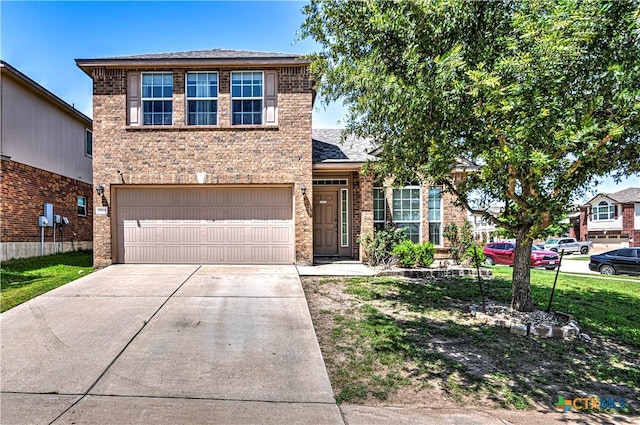 9505 Shimla Dr, Killeen, TX 76542 - traditional-style house with driveway, an attached garage, brick siding, and a shingled roof