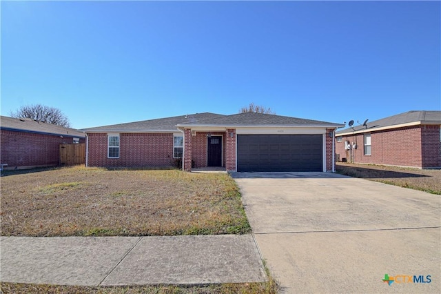 single story home featuring a garage