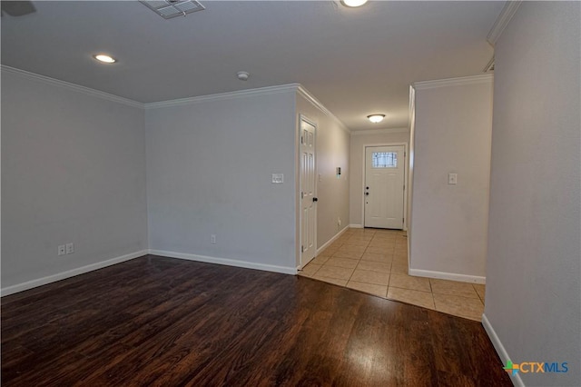 entryway featuring light hardwood / wood-style flooring and ornamental molding