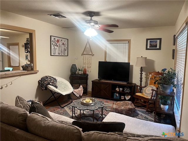 living room with ceiling fan