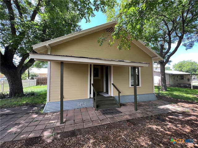 view of front of home with a patio area