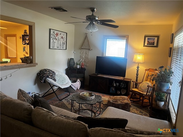 living room with ceiling fan