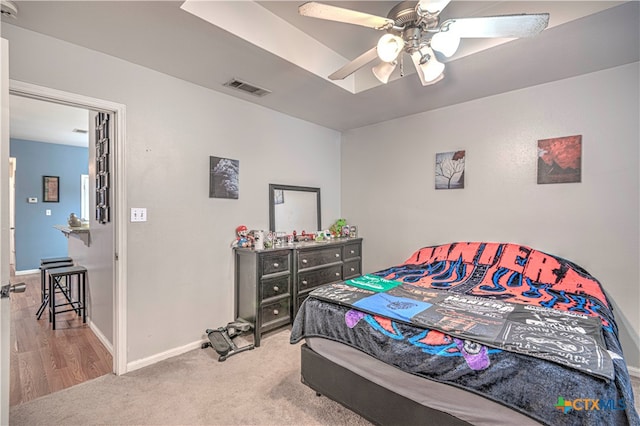 carpeted bedroom featuring ceiling fan