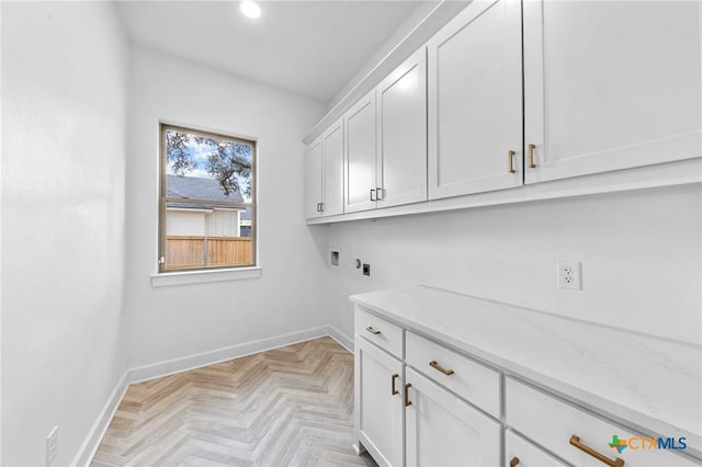 laundry room with washer hookup, cabinet space, baseboards, and recessed lighting