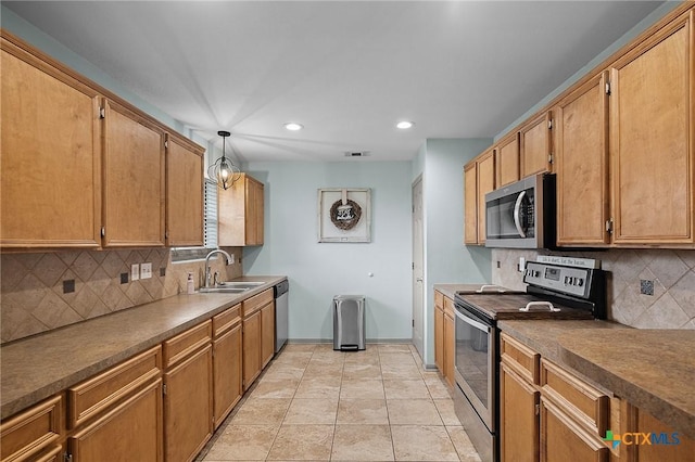 kitchen with visible vents, appliances with stainless steel finishes, tasteful backsplash, a sink, and recessed lighting