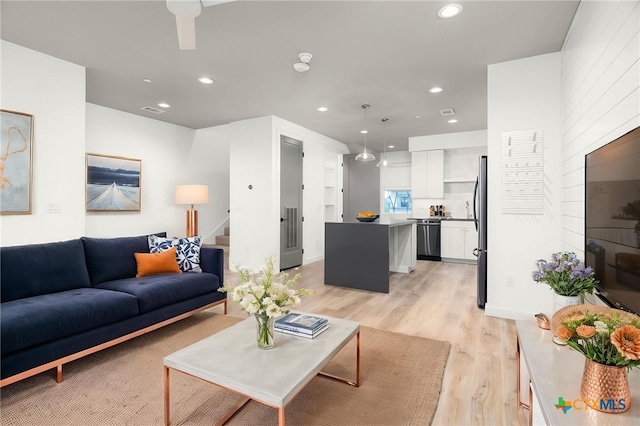 1208 N Academy Ave Unit 3203, New Braunfels, TX 78130 - living area featuring stairs, light wood-type flooring, recessed lighting, and ceiling fan
