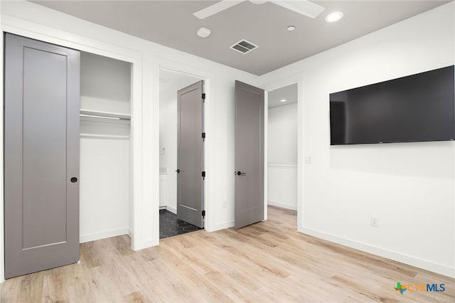 1208 N Academy Ave Unit 3203, New Braunfels, TX 78130 - unfurnished bedroom featuring wood finished floors, a closet, recessed lighting, and baseboards