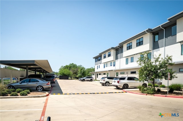 1208 N Academy Ave Unit 3203, New Braunfels, TX 78130 - view of partially covered parking lot