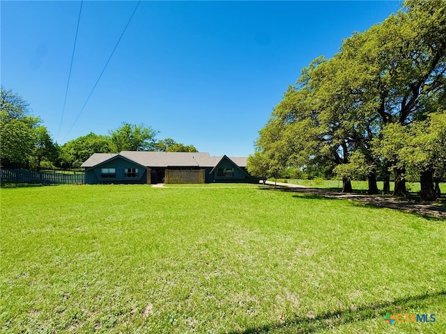 view of yard featuring fence