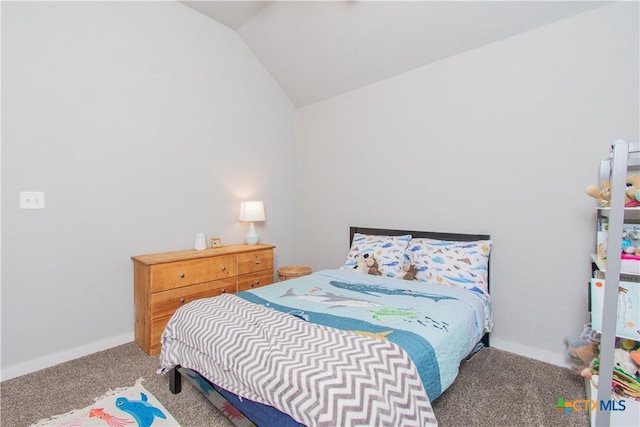 carpeted bedroom featuring vaulted ceiling