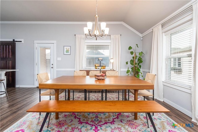 dining space with a chandelier, baseboards, vaulted ceiling, dark wood-style floors, and crown molding