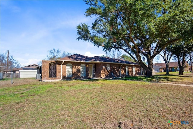 ranch-style house with a front lawn