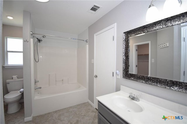 1614 Twisted Oak Dr, Temple, TX 76502 - full bath featuring toilet, vanity, shower / bath combination, and tile patterned flooring
