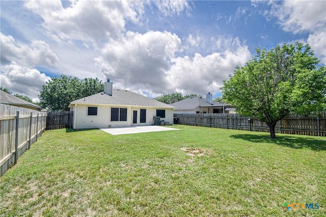 1614 Twisted Oak Dr, Temple, TX 76502 - rear view of house featuring a patio area, a chimney, and stucco siding