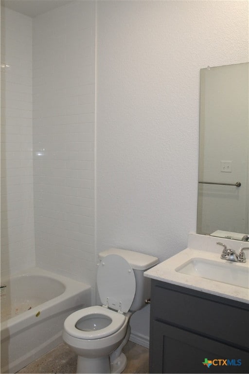 full bathroom with toilet, shower / bathing tub combination, and vanity