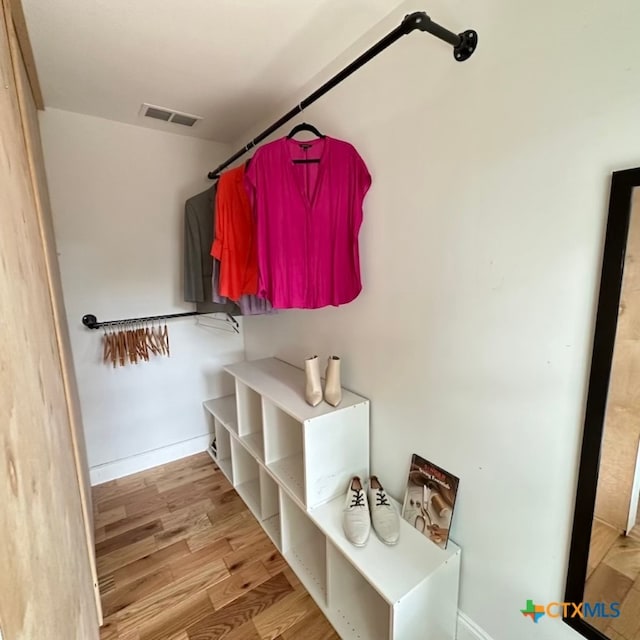 mudroom with light wood-type flooring