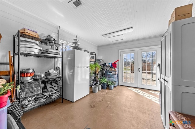 interior space featuring french doors and visible vents