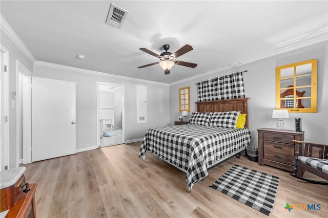 bedroom featuring light wood finished floors, baseboards, visible vents, ceiling fan, and ornamental molding