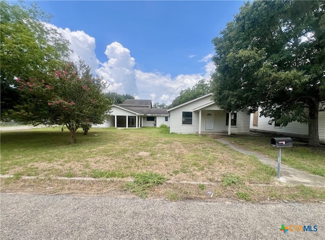 view of front of home with a front yard