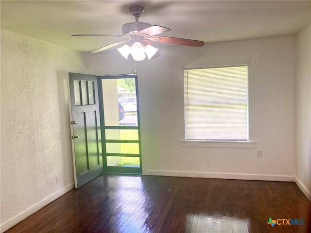 708 E Loma Vista Ave, Victoria, TX 77901 - spare room featuring wood-type flooring, a textured wall, plenty of natural light, and ceiling fan