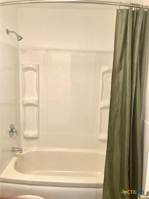 708 E Loma Vista Ave, Victoria, TX 77901 - full bathroom with shower / bathtub combination with curtain