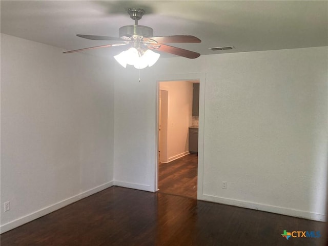 708 E Loma Vista Ave, Victoria, TX 77901 - unfurnished room featuring dark wood-style floors and ceiling fan