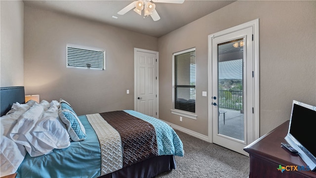 bedroom with light colored carpet, ceiling fan, and access to exterior