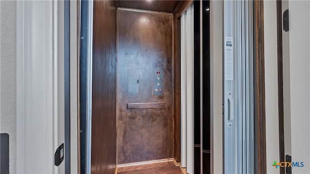 interior space featuring wood-type flooring