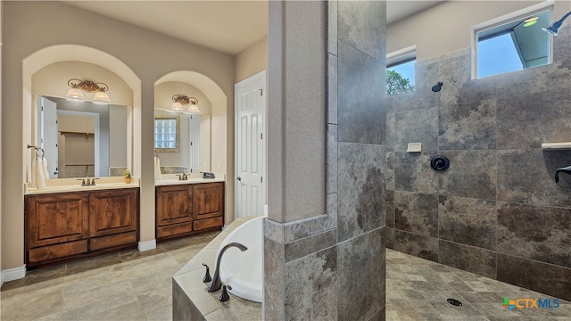 bathroom with plus walk in shower and vanity