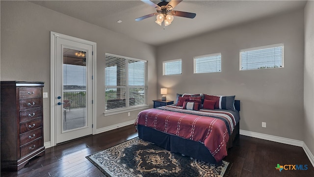 bedroom with access to exterior, ceiling fan, and dark hardwood / wood-style floors