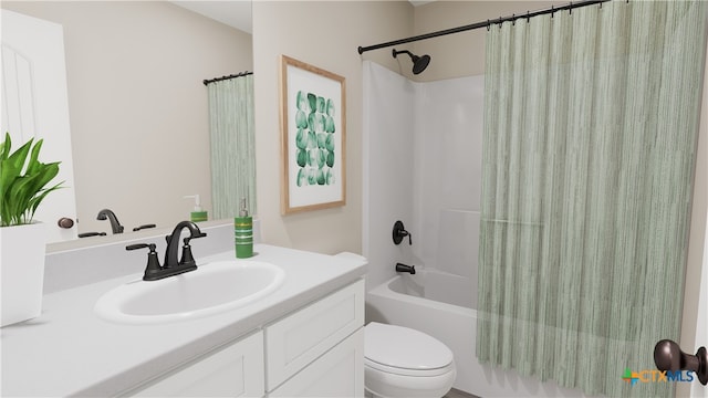 full bathroom with vanity, shower / bath combination with curtain, and toilet