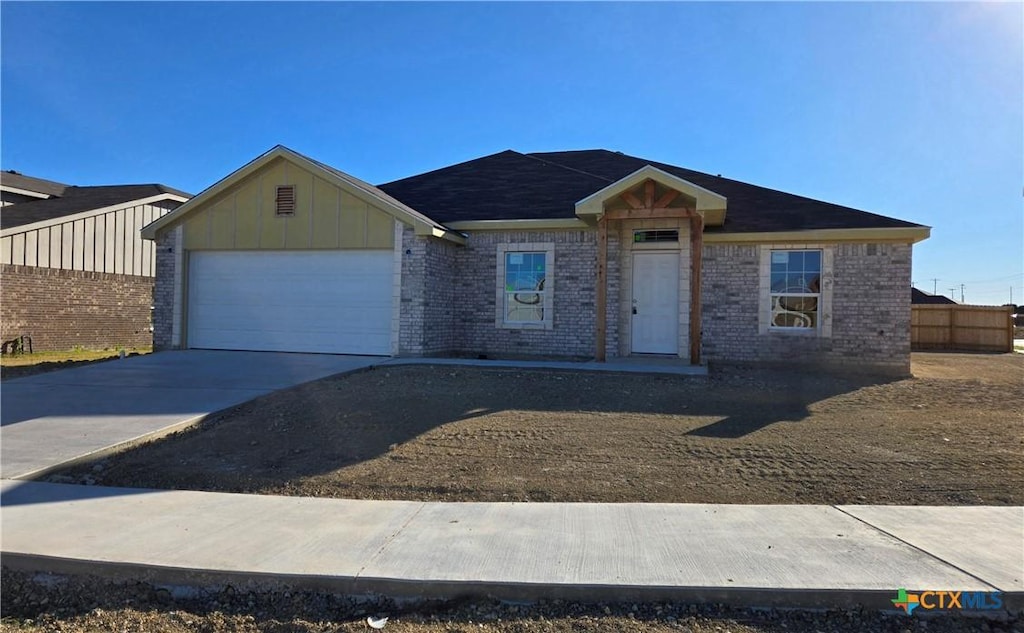 ranch-style house with a garage