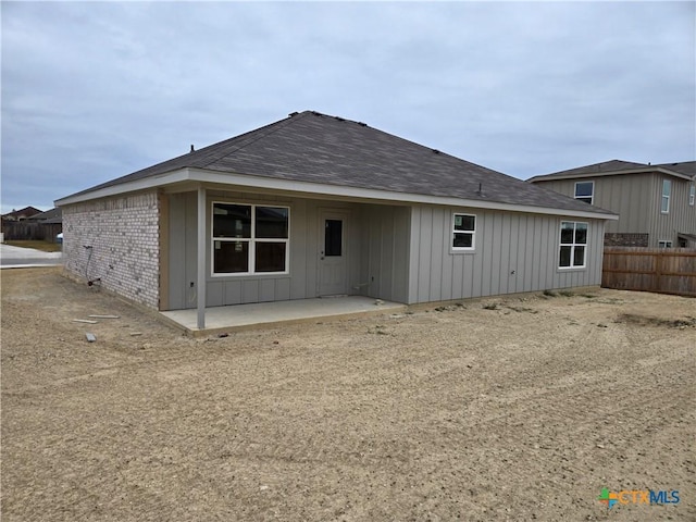 back of house featuring a patio