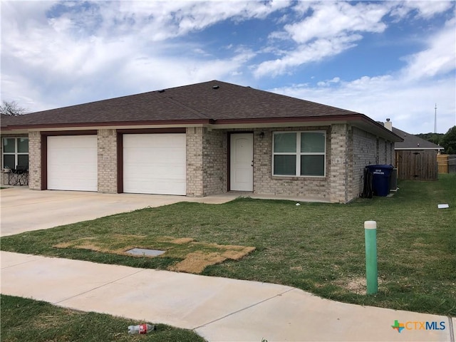 1818 Castroville Trl, Copperas Cove, TX 76522 - ranch-style home featuring an attached garage, driveway, and brick siding