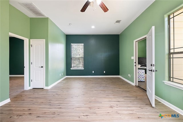 180 Jim Bowie Dr, Paige, TX 78659 - empty room featuring ceiling fan, wood finished floors, and baseboards