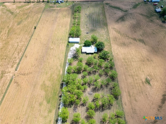birds eye view of property featuring a rural view