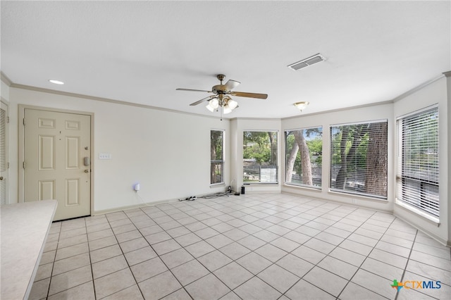 365 S Gilbert Ave, New Braunfels, TX 78130 - empty room with ornamental molding, plenty of natural light, ceiling fan, light tile patterned floors, and recessed lighting