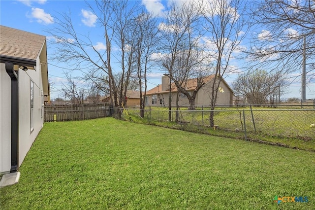 view of yard featuring a fenced backyard