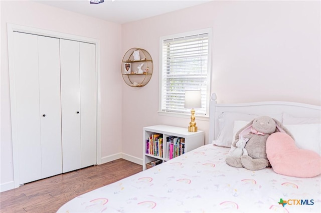 401 Hampshire St, Victoria, TX 77904 - bedroom with wood finished floors and a closet