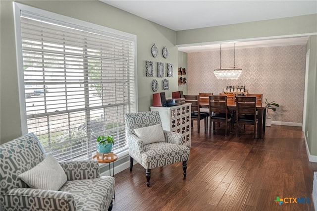 401 Hampshire St, Victoria, TX 77904 - sitting room featuring wallpapered walls, wood finished floors, and a chandelier