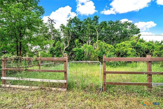 1210 Old Martindale Rd, San Marcos, TX 78666 - view of gate featuring fence