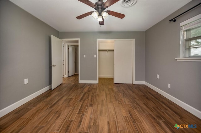 248 Park Rd, Port Lavaca, TX 77979 - unfurnished bedroom with baseboards, a closet, and wood finished floors