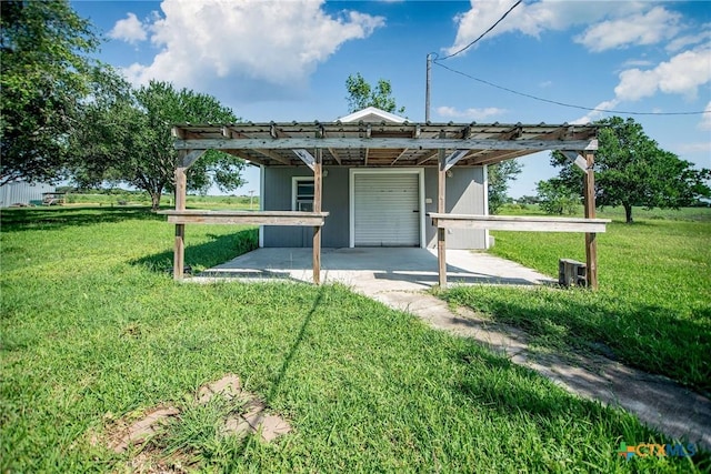 248 Park Rd, Port Lavaca, TX 77979 - view of front of home with a front yard, a patio, central air condition unit, and a pergola