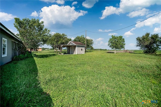 248 Park Rd, Port Lavaca, TX 77979 - view of grassy yard featuring a carport