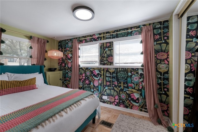 bedroom with visible vents