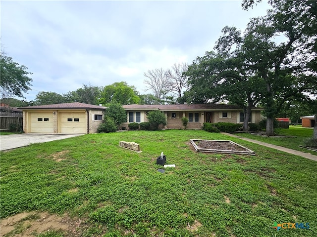 ranch-style home with a front lawn and a garage