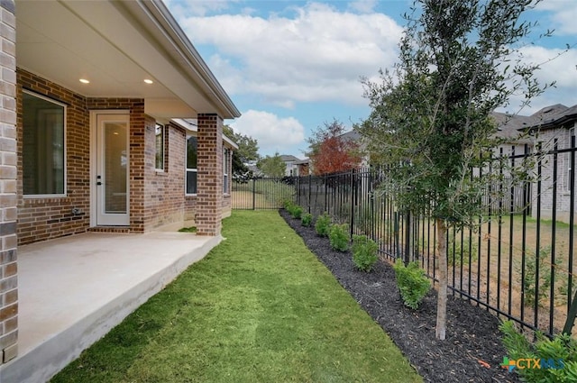 view of yard with a patio area